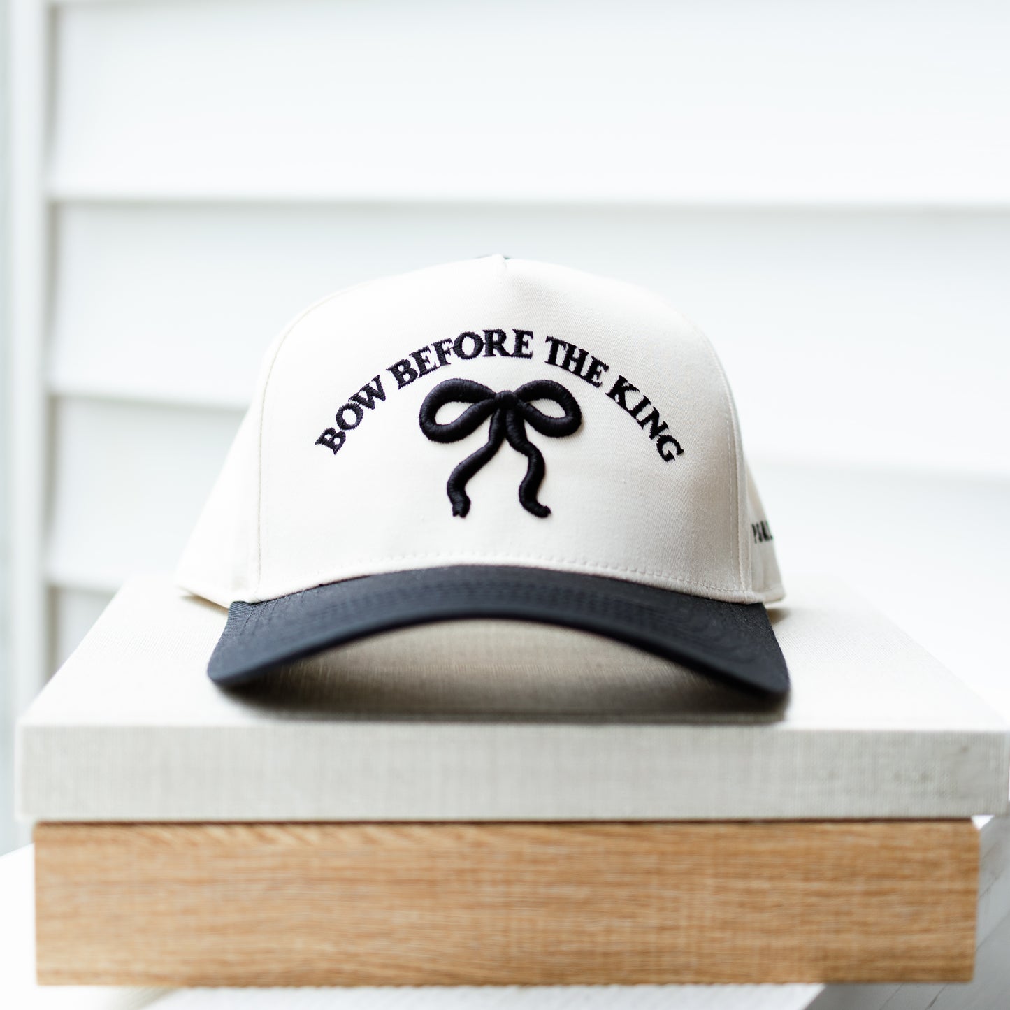 BOW BEFORE THE KING HAT IN BLACK