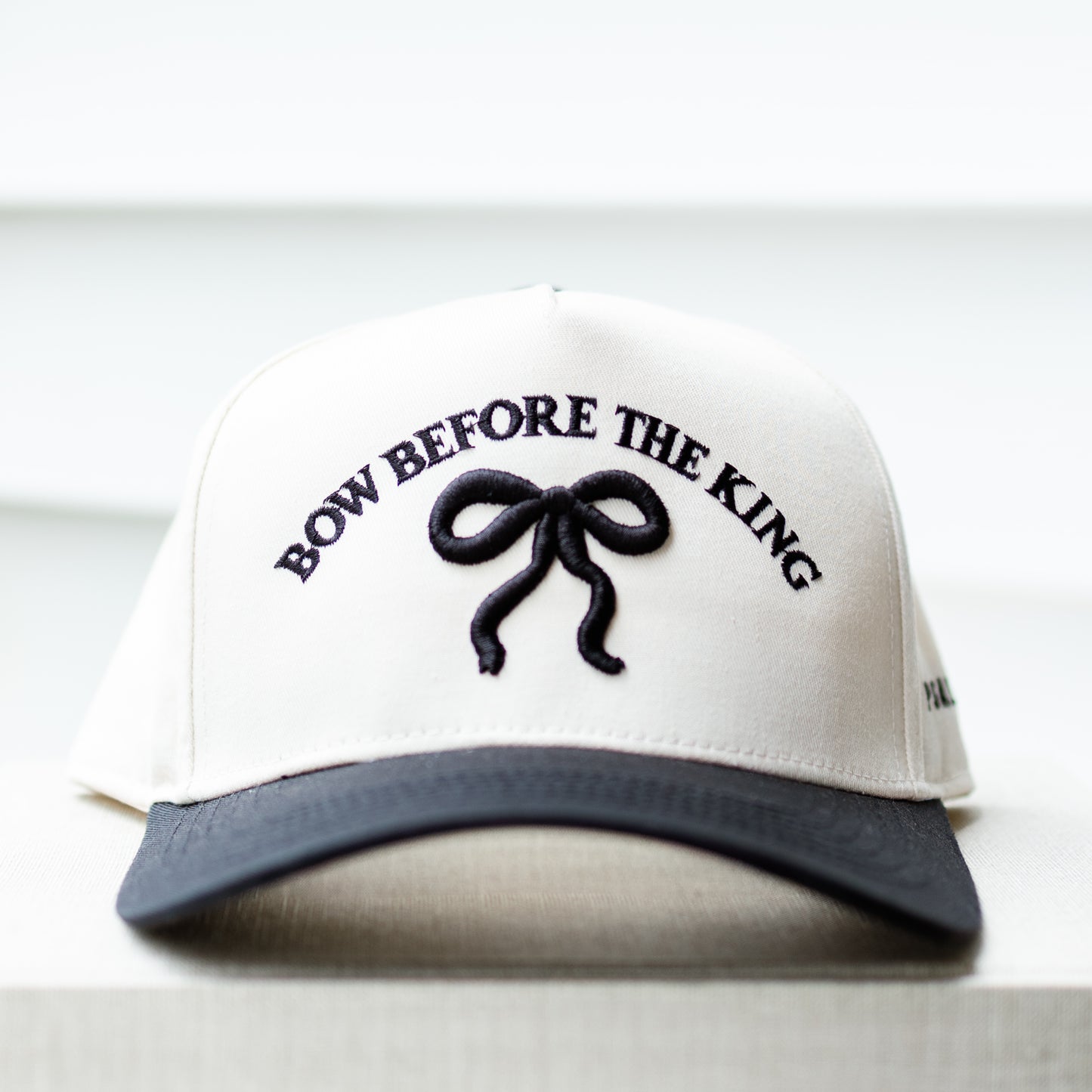 BOW BEFORE THE KING HAT IN BLACK